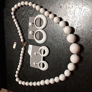 Graduated white bead necklace with choice of clipon or post hoop earrings